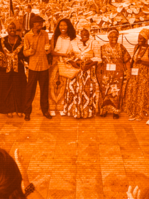 Unidas members gathered in a circle during the 2022 network meeting