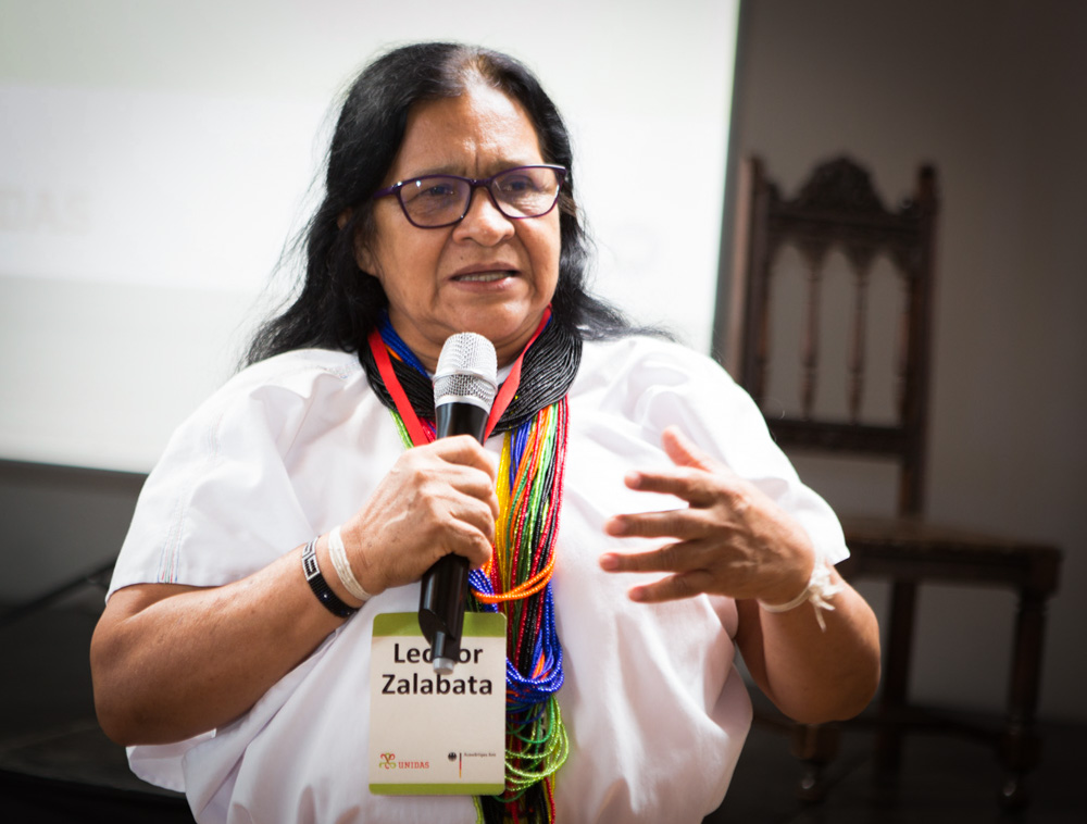 Woman talking into microphone